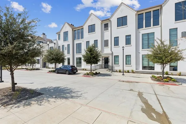 a view of a street with houses