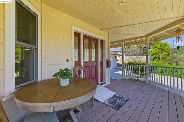 a view of room with wooden floor