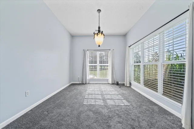 a view of a chandelier in a room