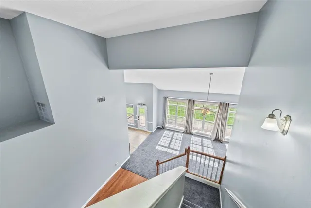 a view of a room with windows