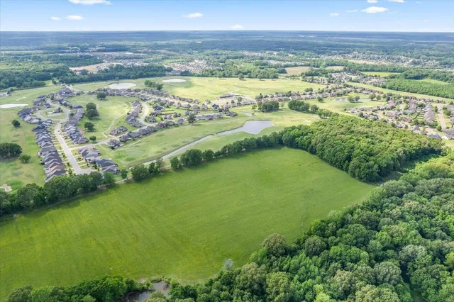 a view of a city with an ocean