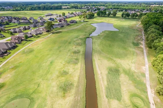 a view of an swimming pool and outdoor space