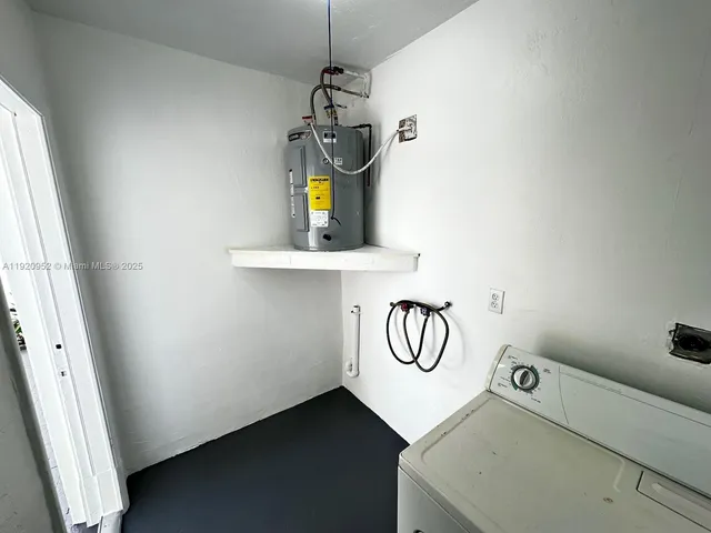 a view of a house with swimming pool and a yard