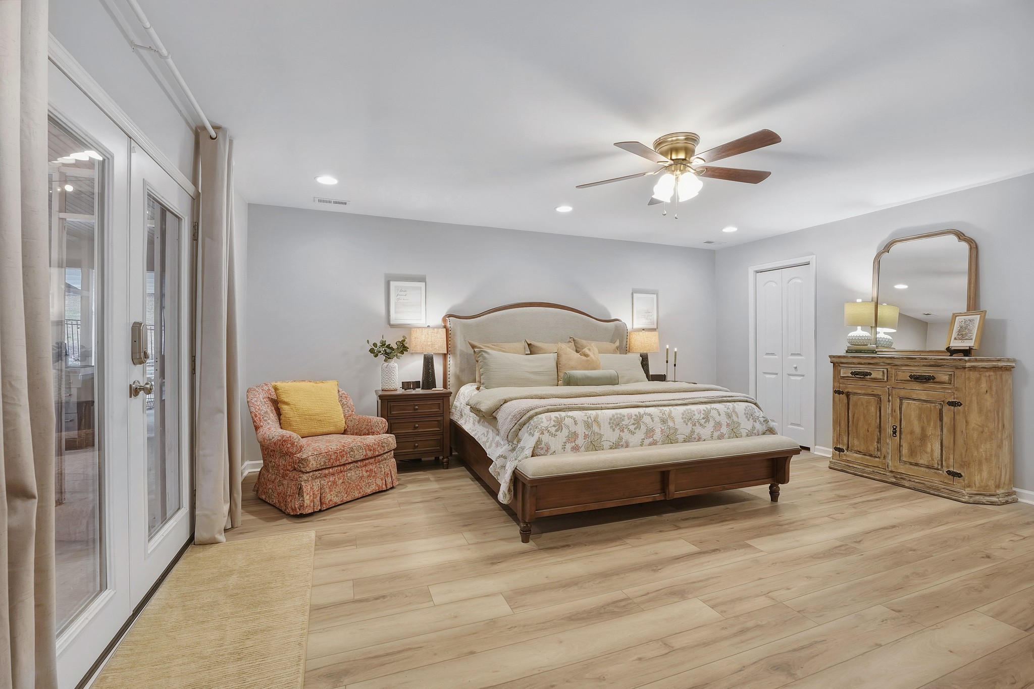 811 Hogans Branch Road Hendersonville, TN 37075 - Photo 13 of 34 a bedroom with a bed and ceiling chandelier
