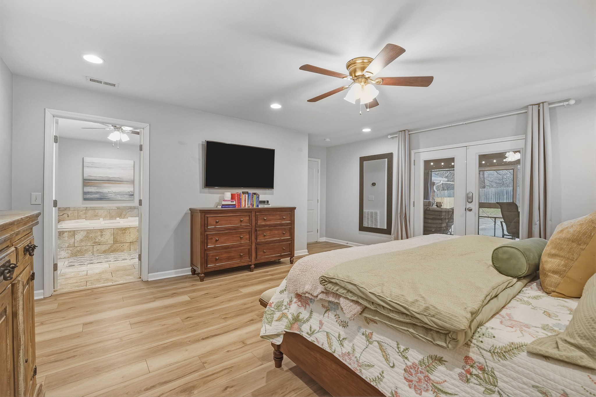 811 Hogans Branch Road Hendersonville, TN 37075 - Photo 14 of 34 a bedroom with a bed and a flat screen tv