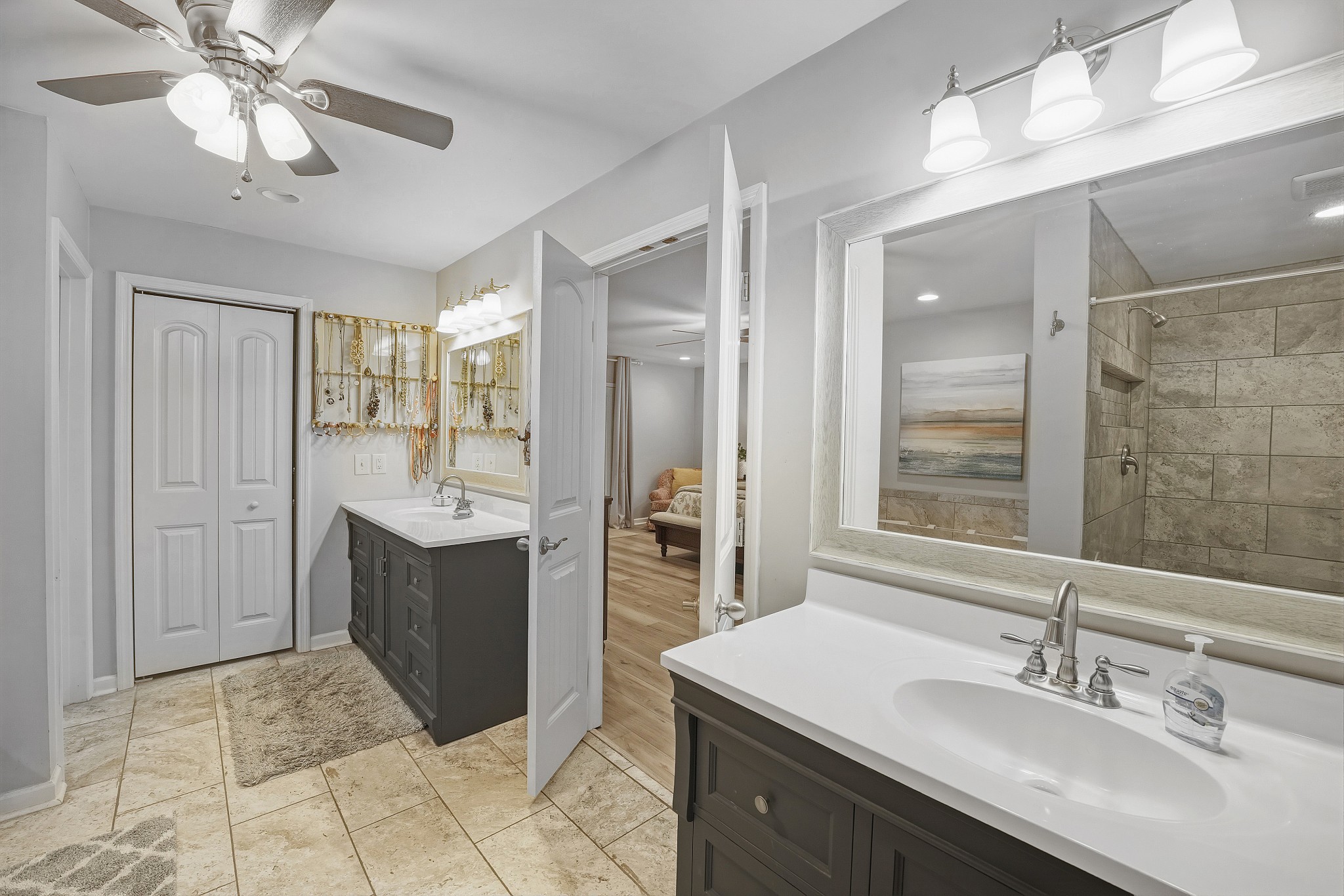 811 Hogans Branch Road Hendersonville, TN 37075 - Photo 18 of 34 a spacious bathroom with a sink double vanity and a mirror