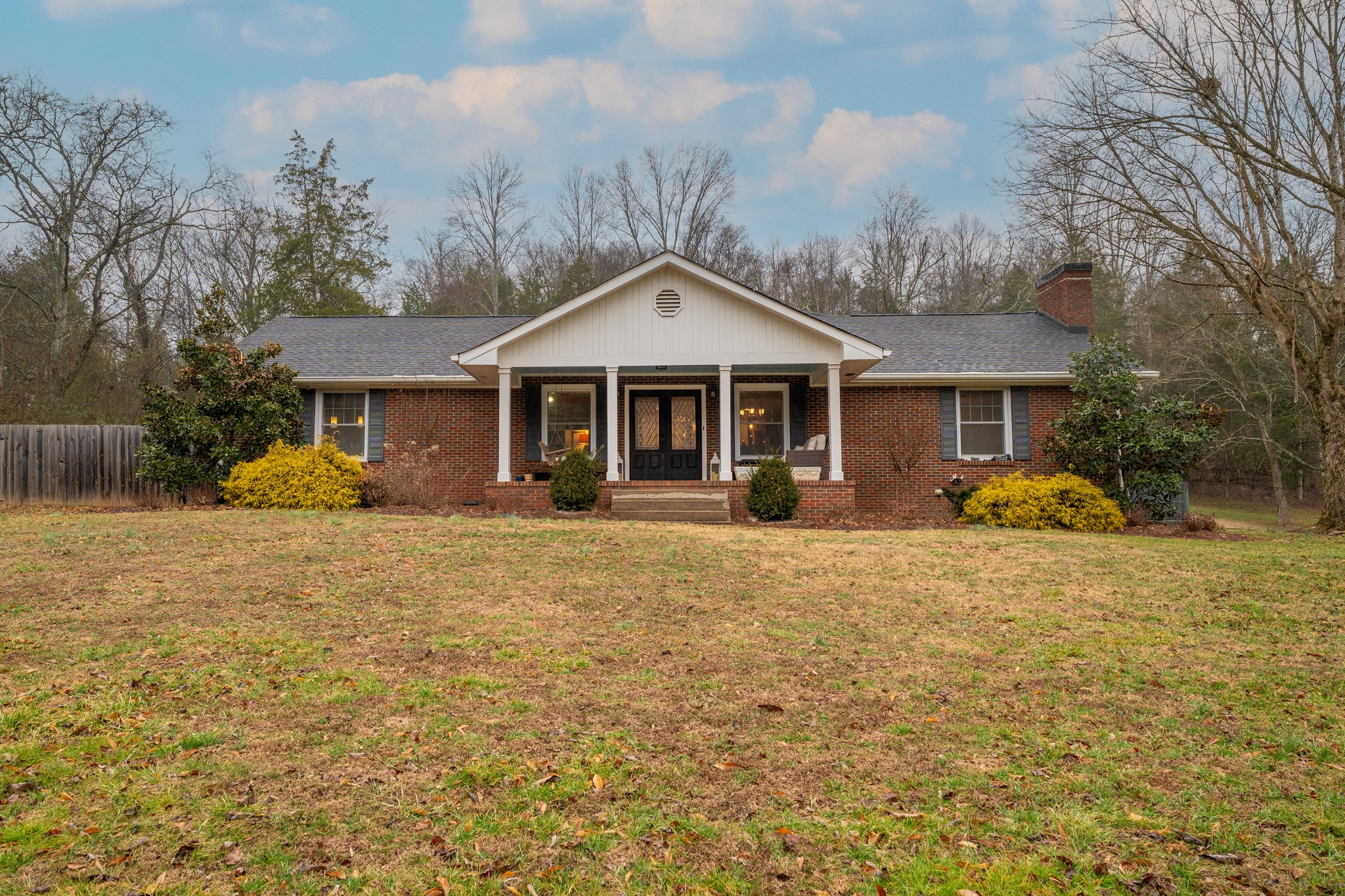 811 Hogans Branch Road Hendersonville, TN 37075 - Photo 22 of 34 a front view of a house with garden