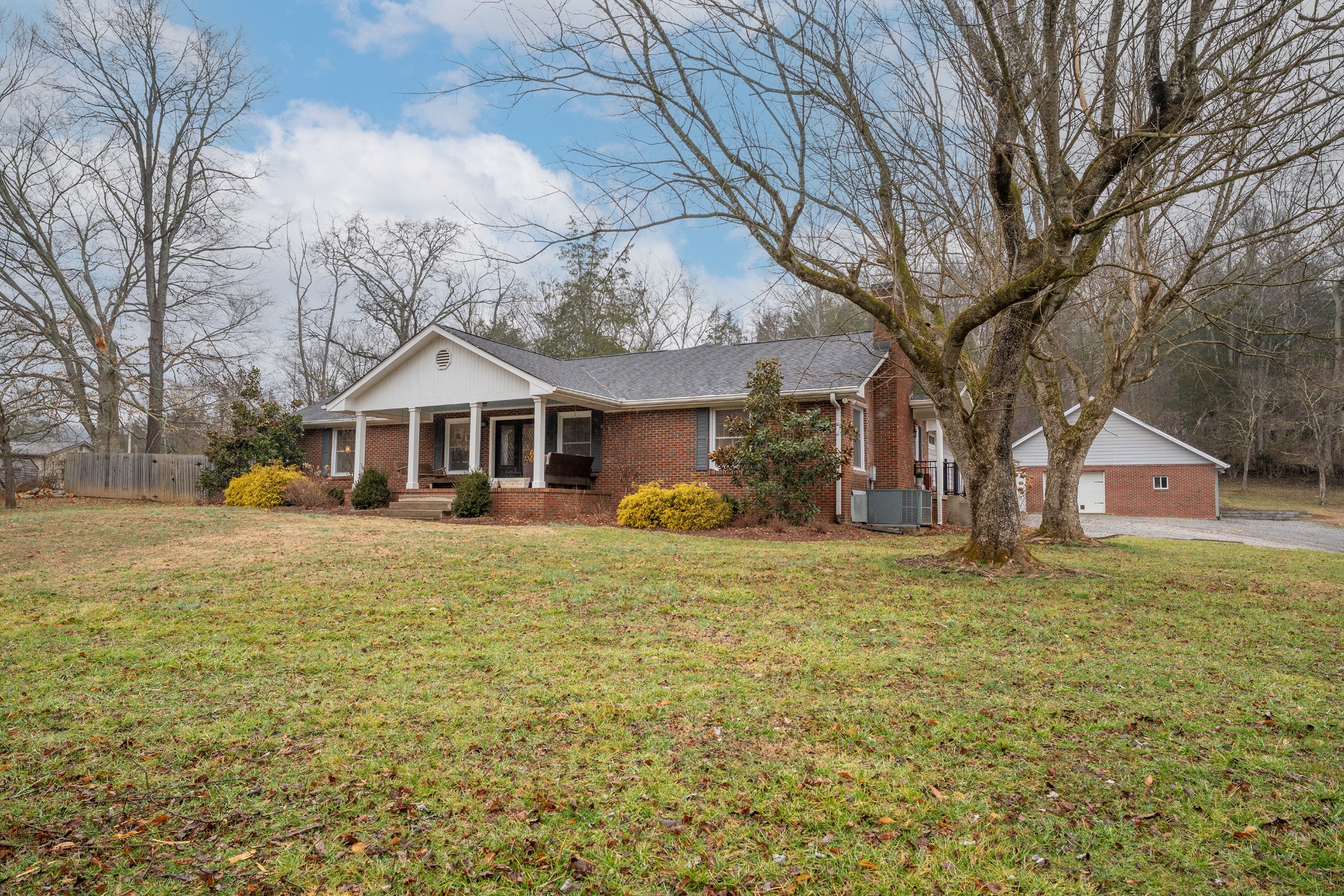 811 Hogans Branch Road Hendersonville, TN 37075 - Photo 23 of 34 a front view of a house with a garden