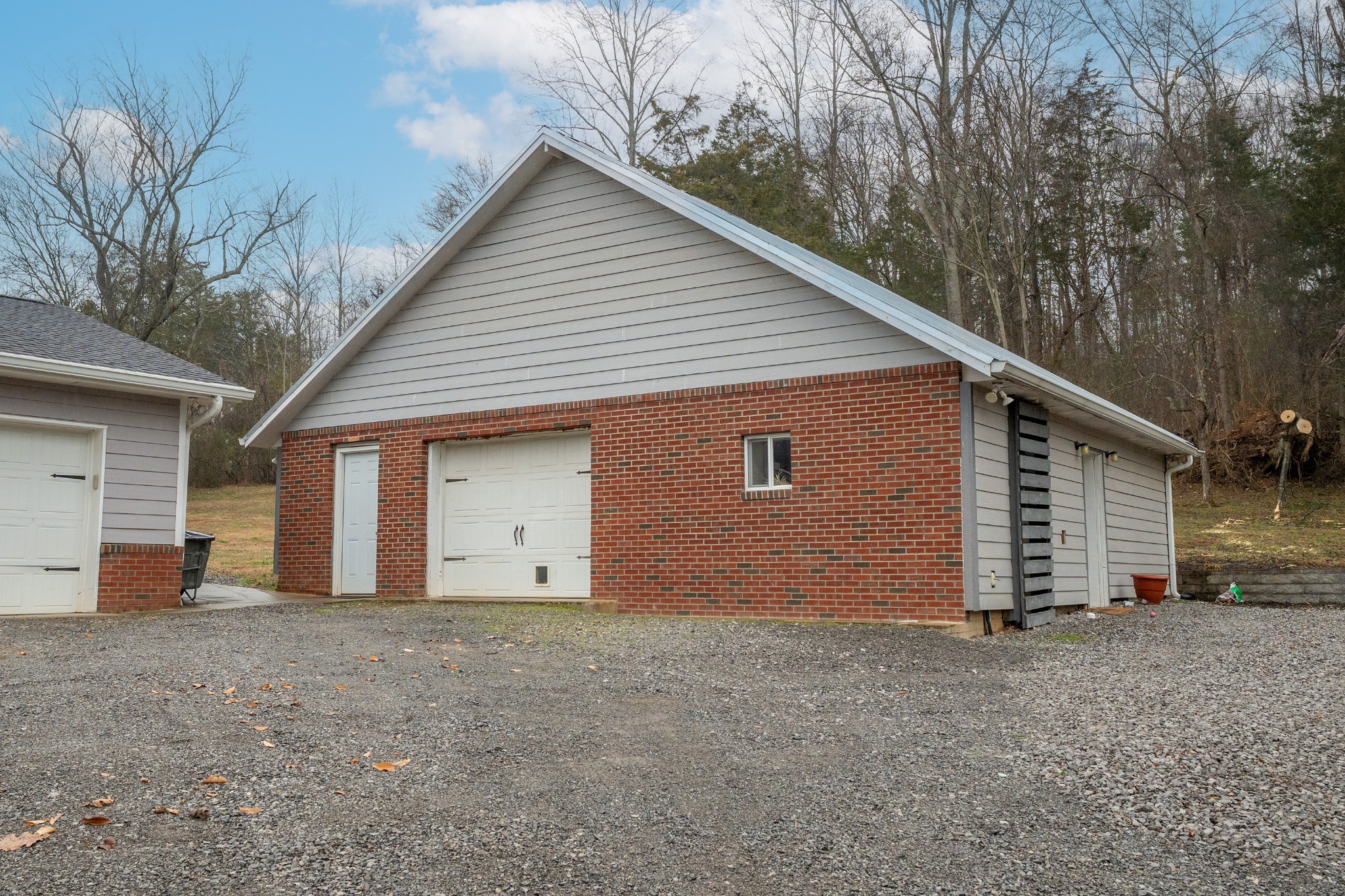 811 Hogans Branch Road Hendersonville, TN 37075 - Photo 25 of 34 a view of a house with a yard and garage