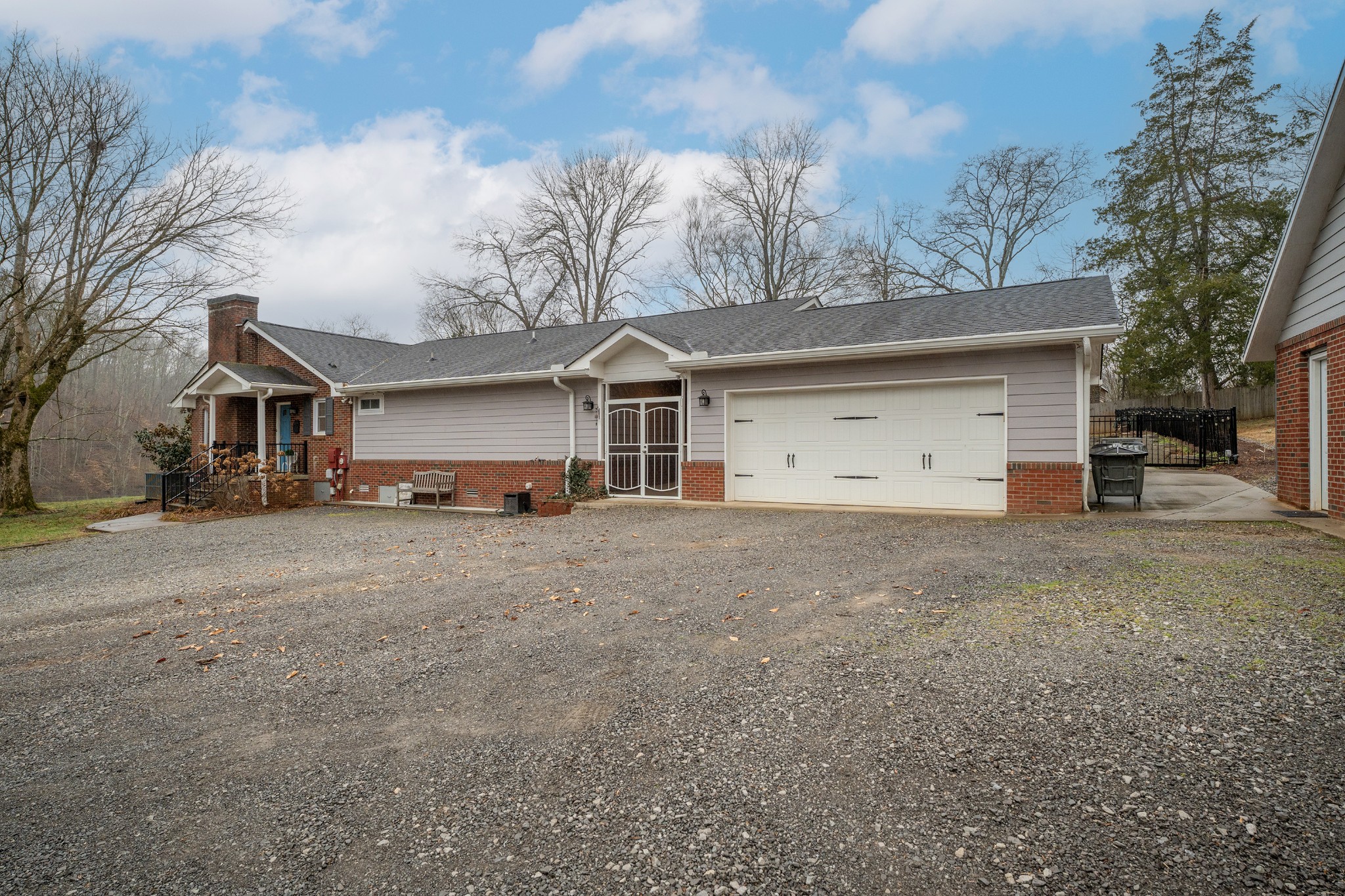 811 Hogans Branch Road Hendersonville, TN 37075 - Photo 26 of 34 a front view of a house with a yard and garage