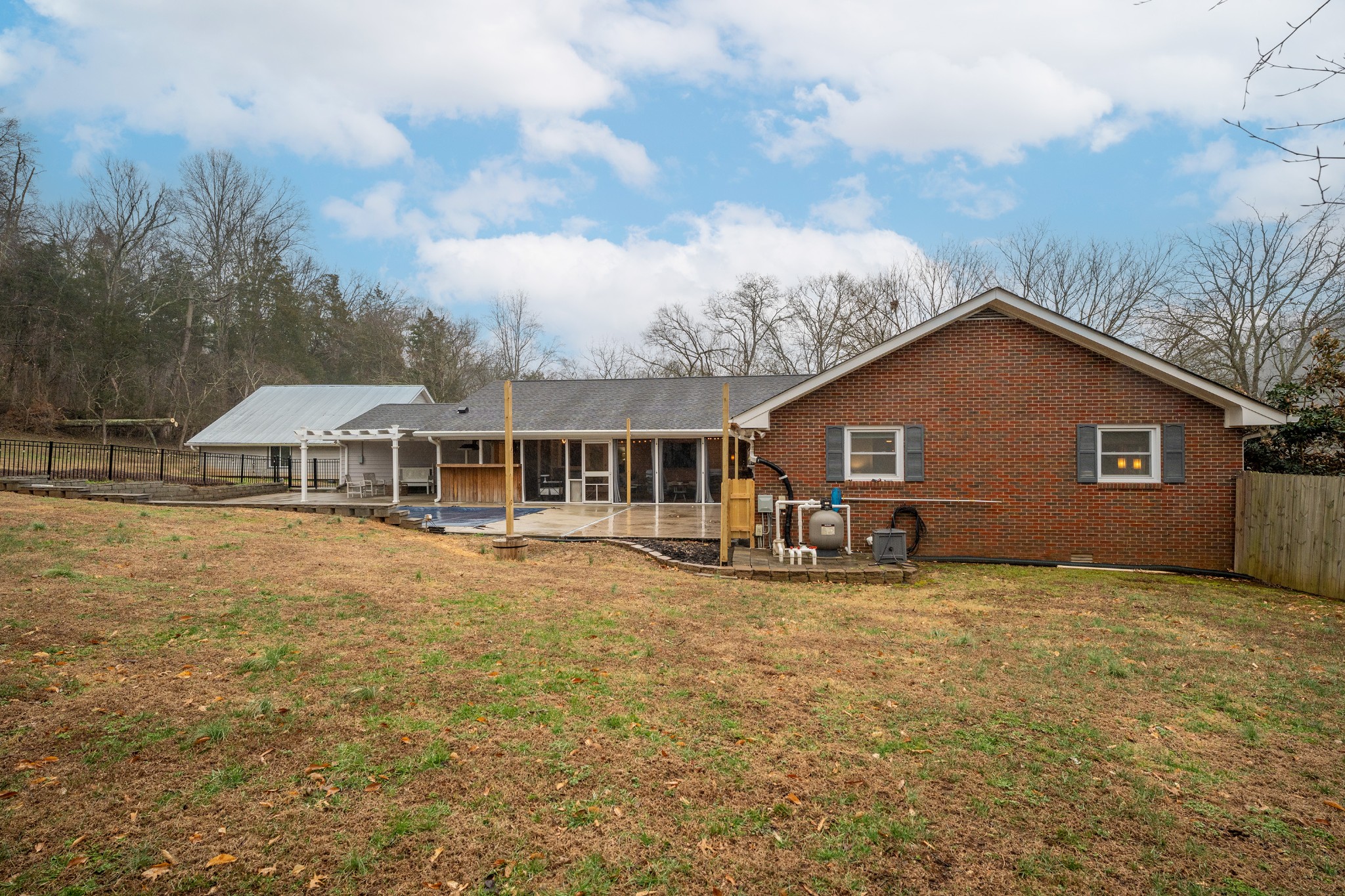 811 Hogans Branch Road Hendersonville, TN 37075 - Photo 28 of 34 a view of a house with backyard porch and garden