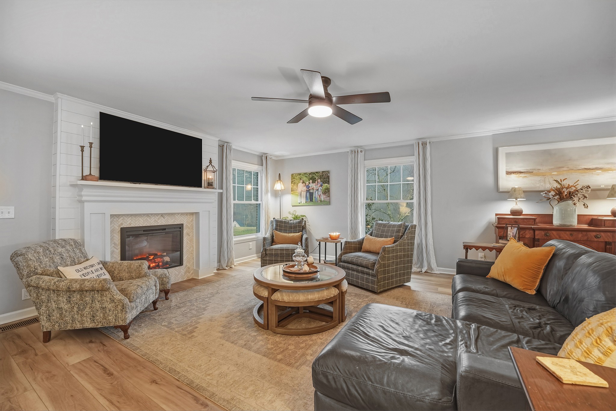 811 Hogans Branch Road Hendersonville, TN 37075 - Photo 8 of 34 a living room with furniture and a fireplace