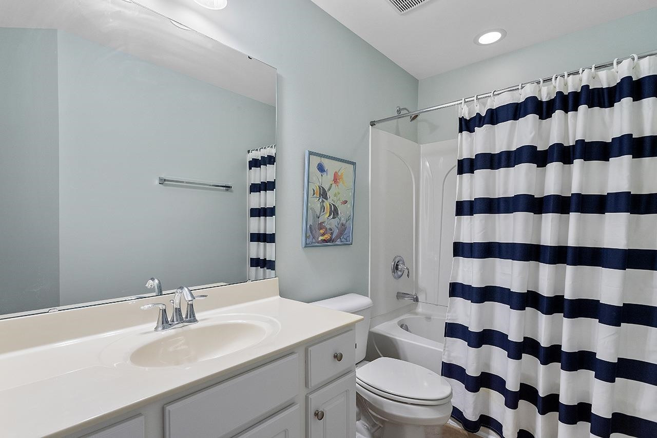 9242 Wooden Road Raleigh, NC 27617 - Photo 24 of 32 This home features THREE full baths! This full bath is located on the third floor across from Bedroom 2 and 3. Full Bath