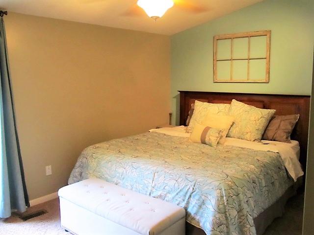3248 Riley Creek Road Normandy, TN 37360 - Photo 16 of 24 a bedroom with a bed and a window