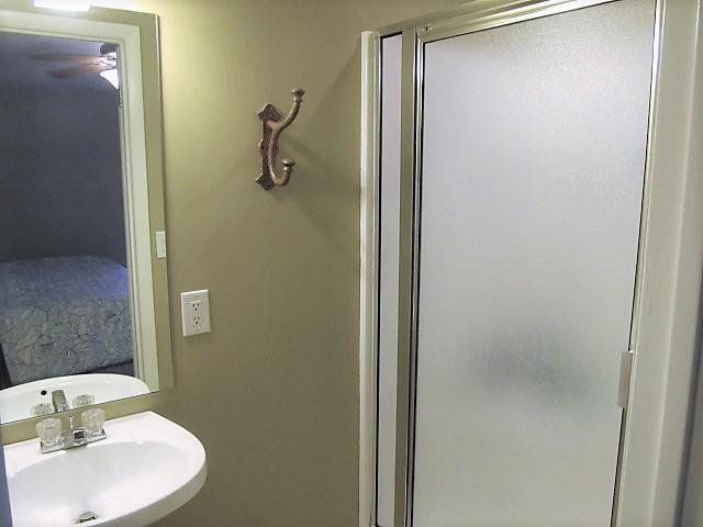 3248 Riley Creek Road Normandy, TN 37360 - Photo 17 of 24 a bathroom with a sink and mirror