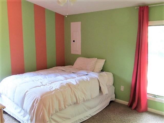 3248 Riley Creek Road Normandy, TN 37360 - Photo 19 of 24 a bedroom with a bed and a mirror