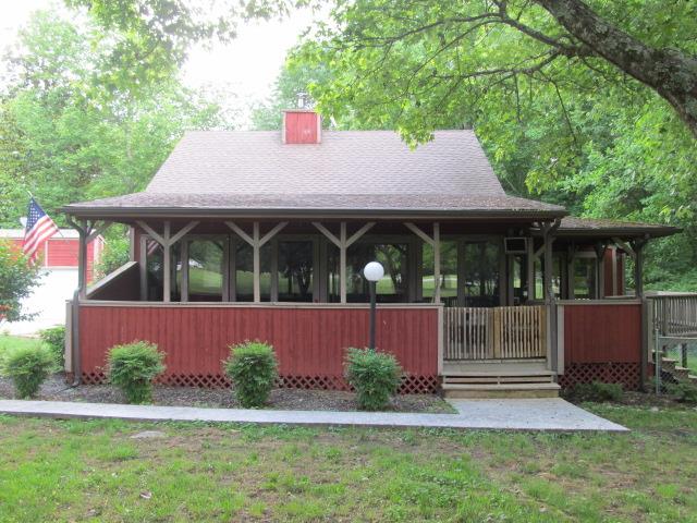 3248 Riley Creek Road Normandy, TN 37360 - Photo 2 of 24 a front view of a house with a garden