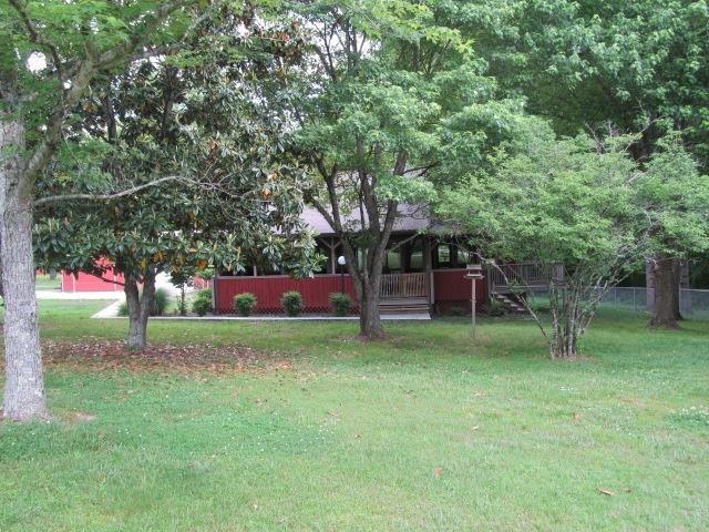 3248 Riley Creek Road Normandy, TN 37360 - Photo 21 of 24 a small garden covered with tall trees