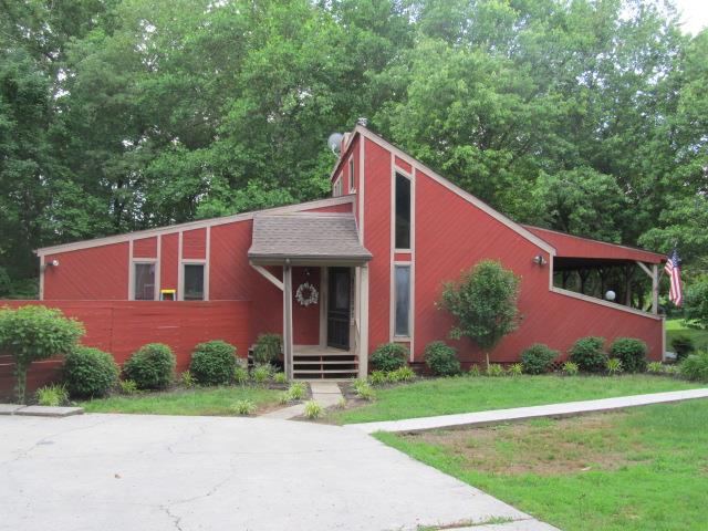 3248 Riley Creek Road Normandy, TN 37360 - Photo 3 of 24 a front view of house with yard and green space
