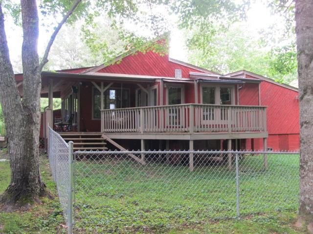 3248 Riley Creek Road Normandy, TN 37360 - Photo 4 of 24 a front view of a house with yard and deck