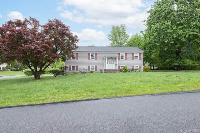 a house view with a garden space