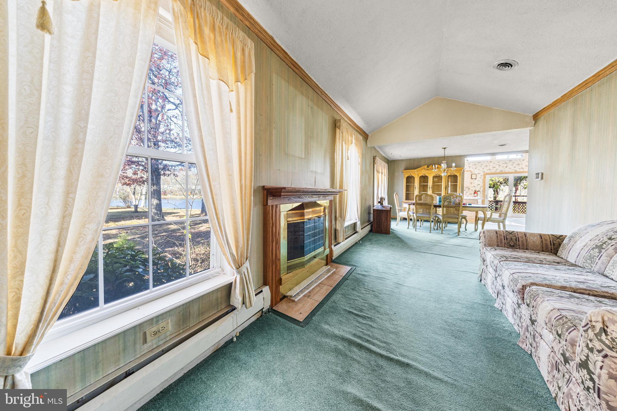 509 Neshaminy Road Croydon, PA 19021 - Photo 11 of 16 a living room with furniture and a fireplace
