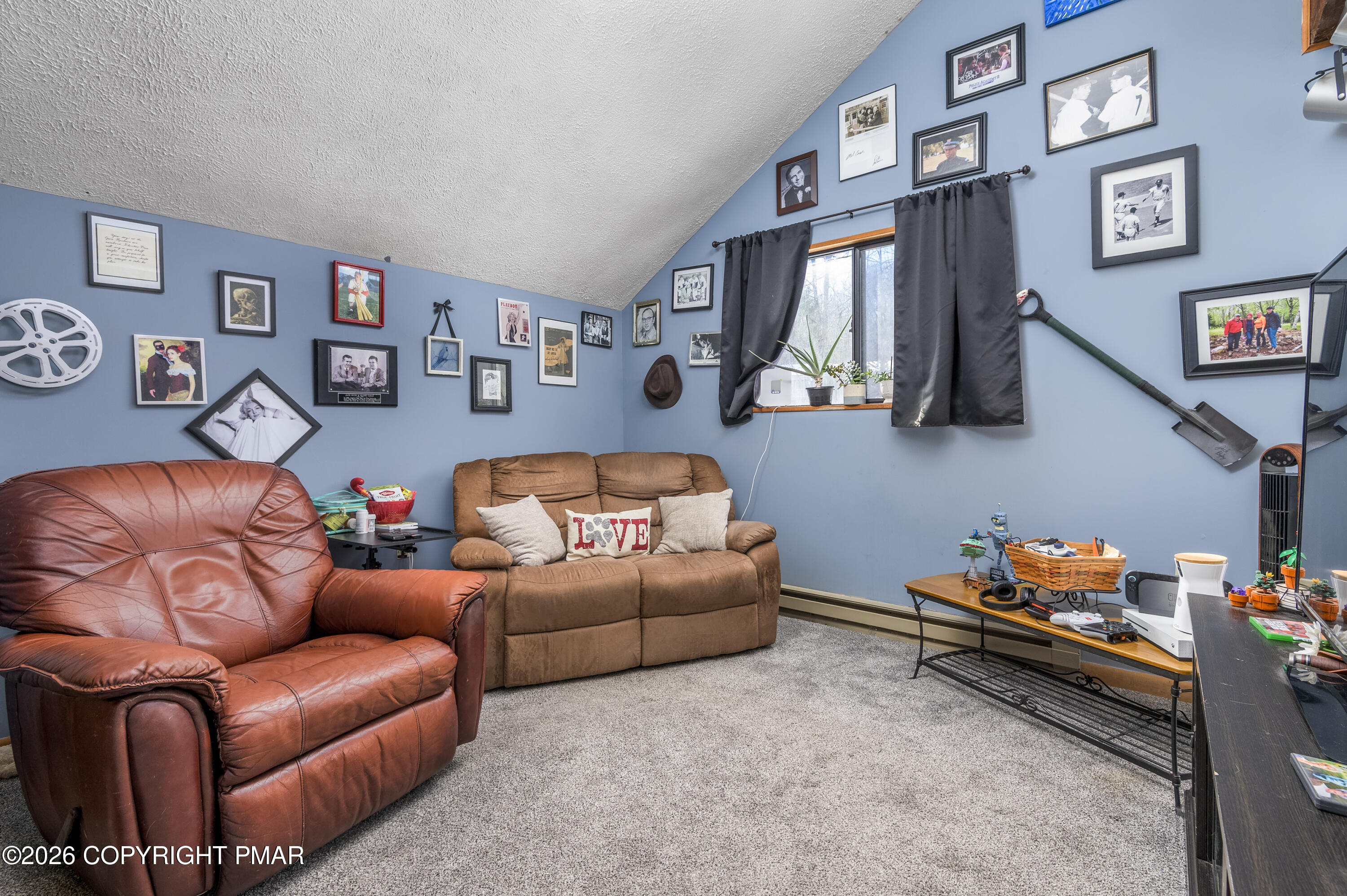 218 Blue Jay Court Bushkill, PA 18324 - Photo 14 of 19 a living room with furniture fireplace and a window