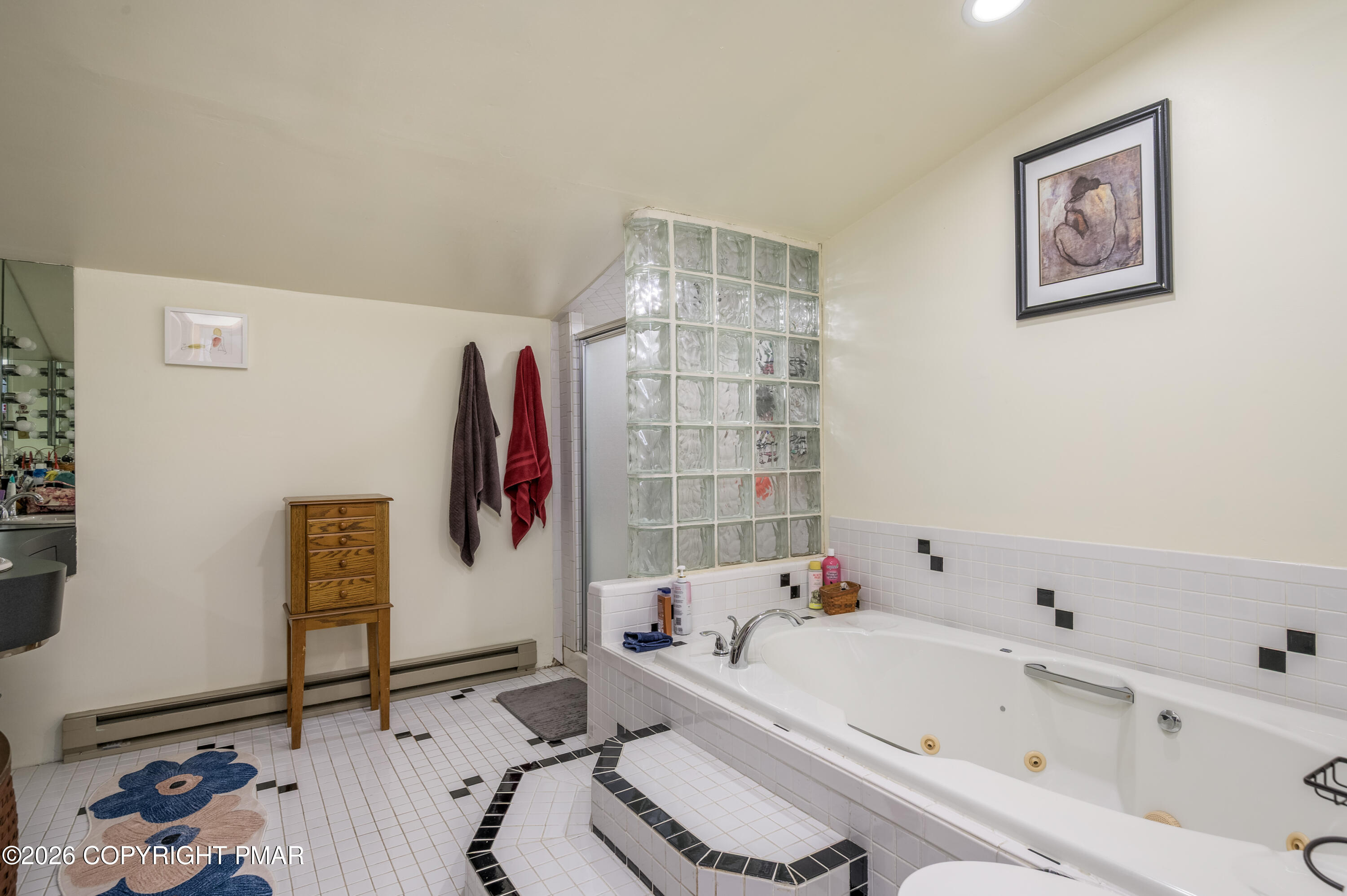 218 Blue Jay Court Bushkill, PA 18324 - Photo 18 of 19 a bathroom with a bathtub and a shower