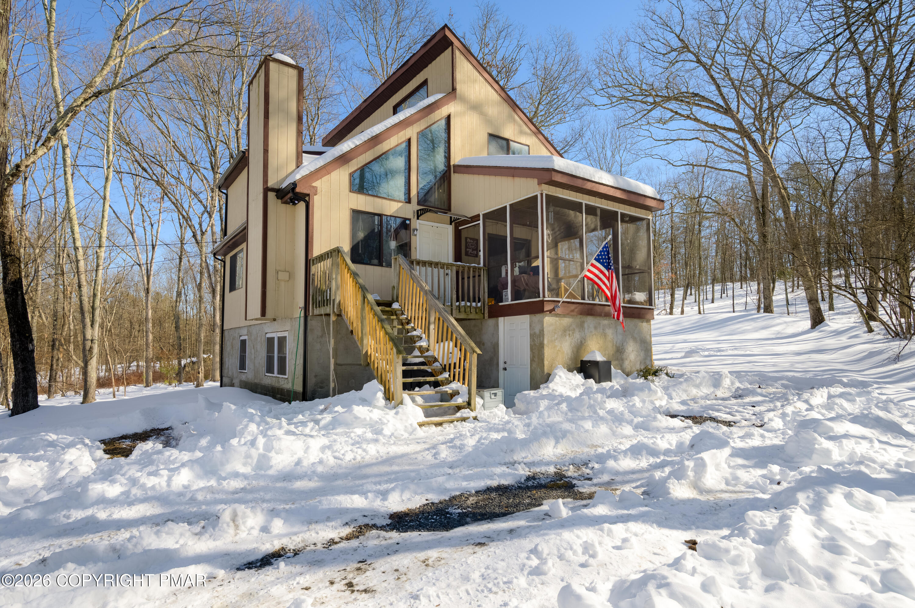 218 Blue Jay Court Bushkill, PA 18324 - Photo 2 of 19 a view of a house with snow on the background