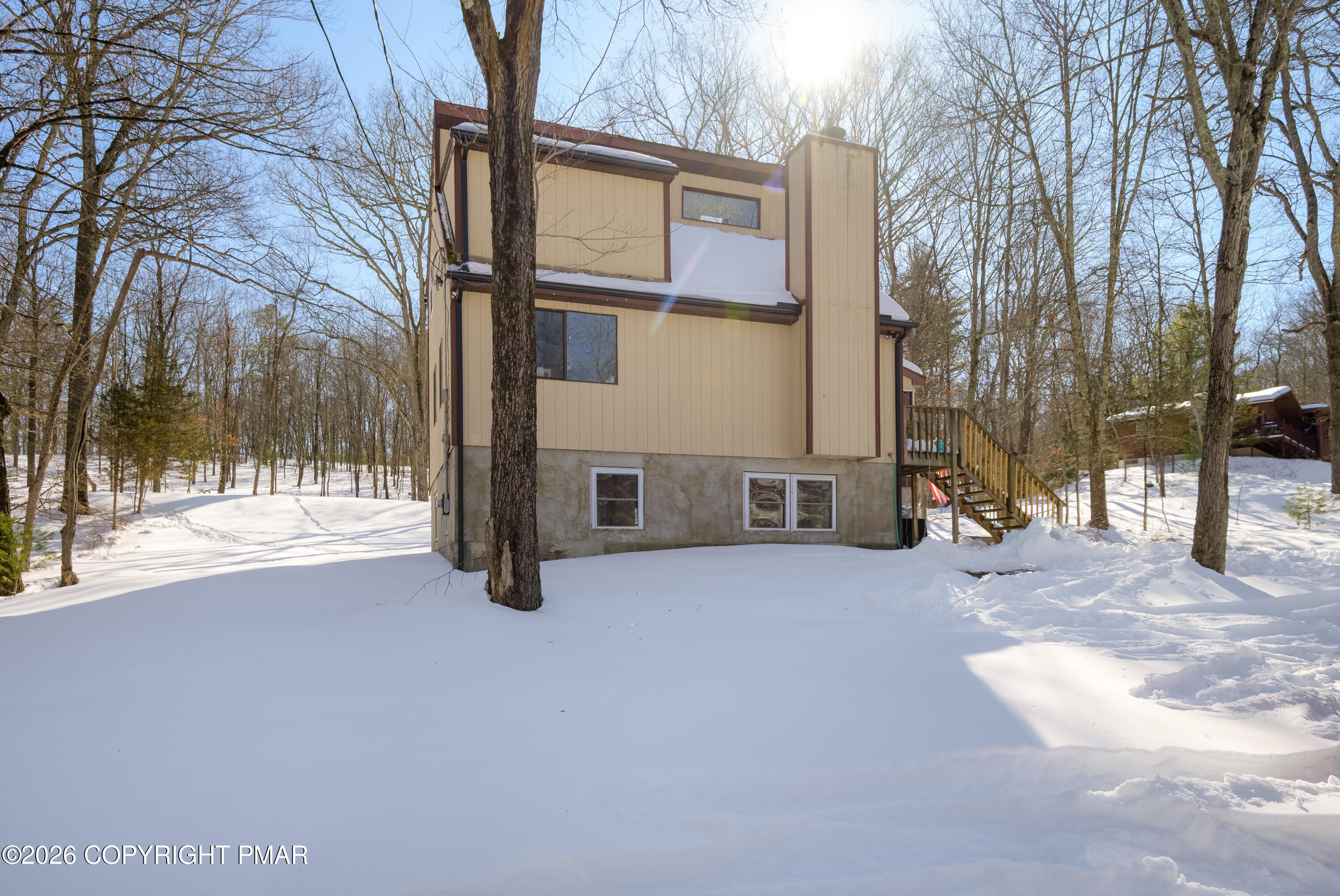 218 Blue Jay Court Bushkill, PA 18324 - Photo 7 of 19 a view of a house with snow on the road