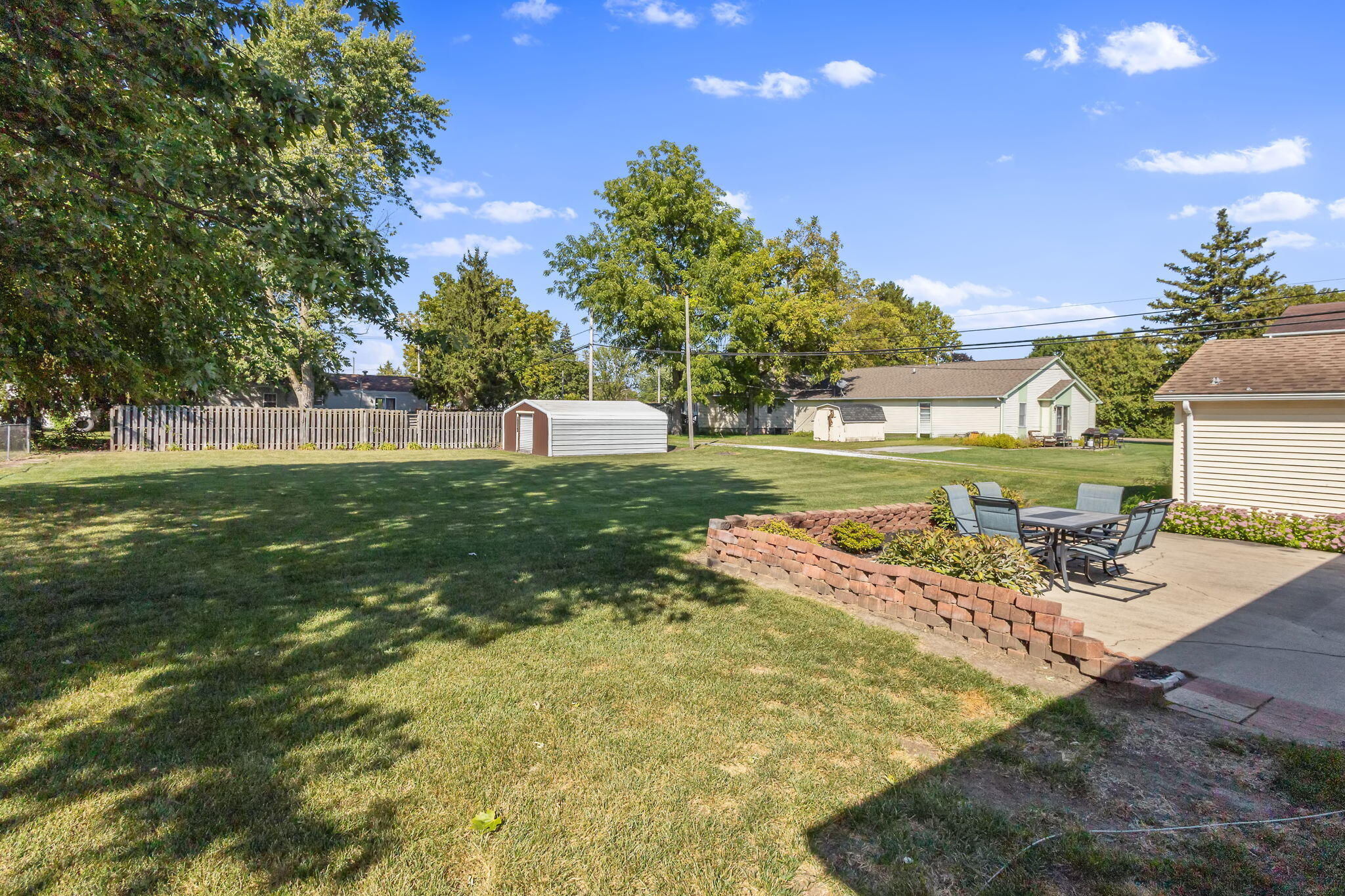 810 East Grace Street Rensselaer, IN 47978 - Photo 16 of 17 a view of a backyard with swimming pool