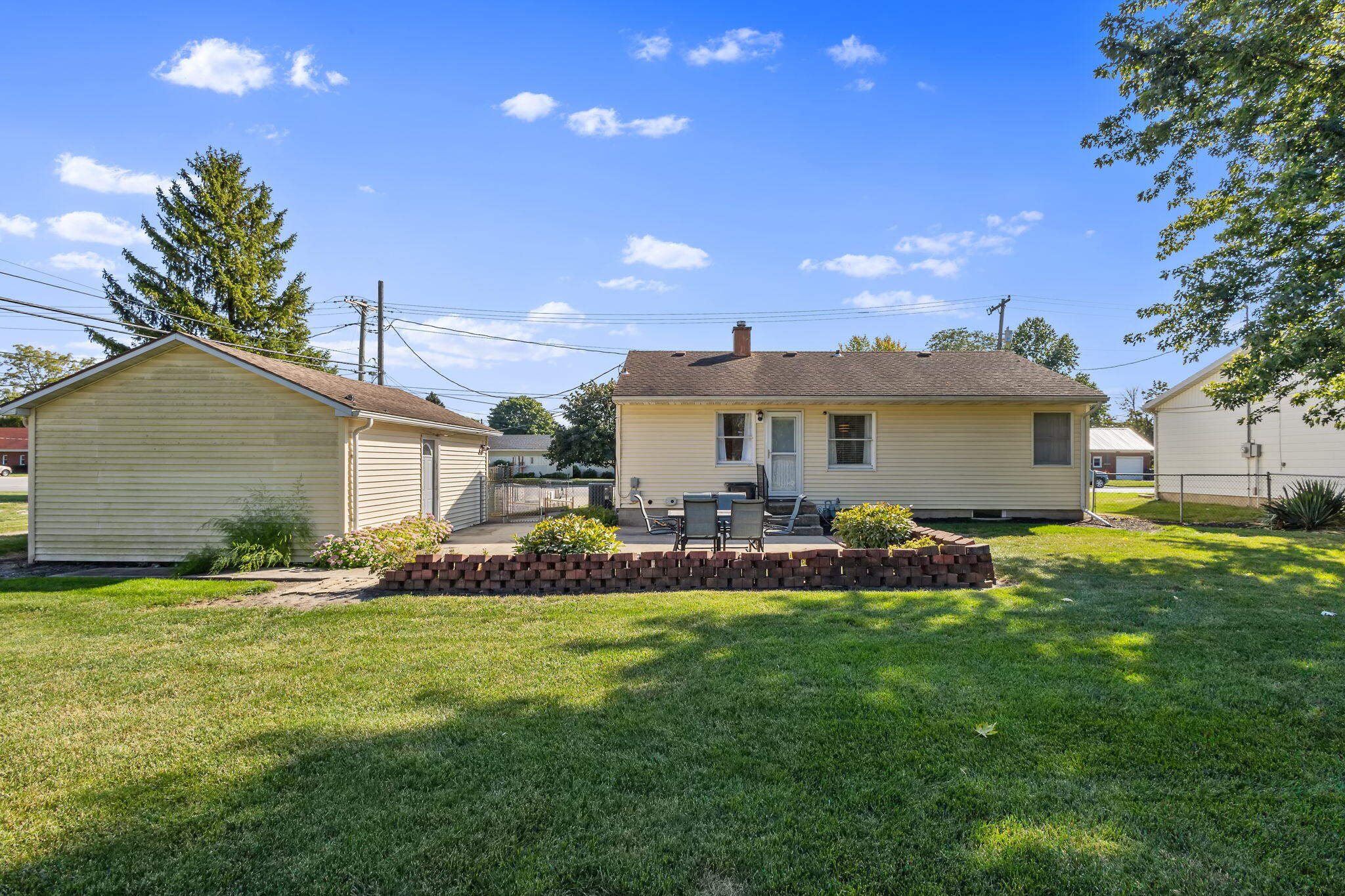 810 East Grace Street Rensselaer, IN 47978 - Photo 17 of 17 a front view of house with yard and outdoor seating
