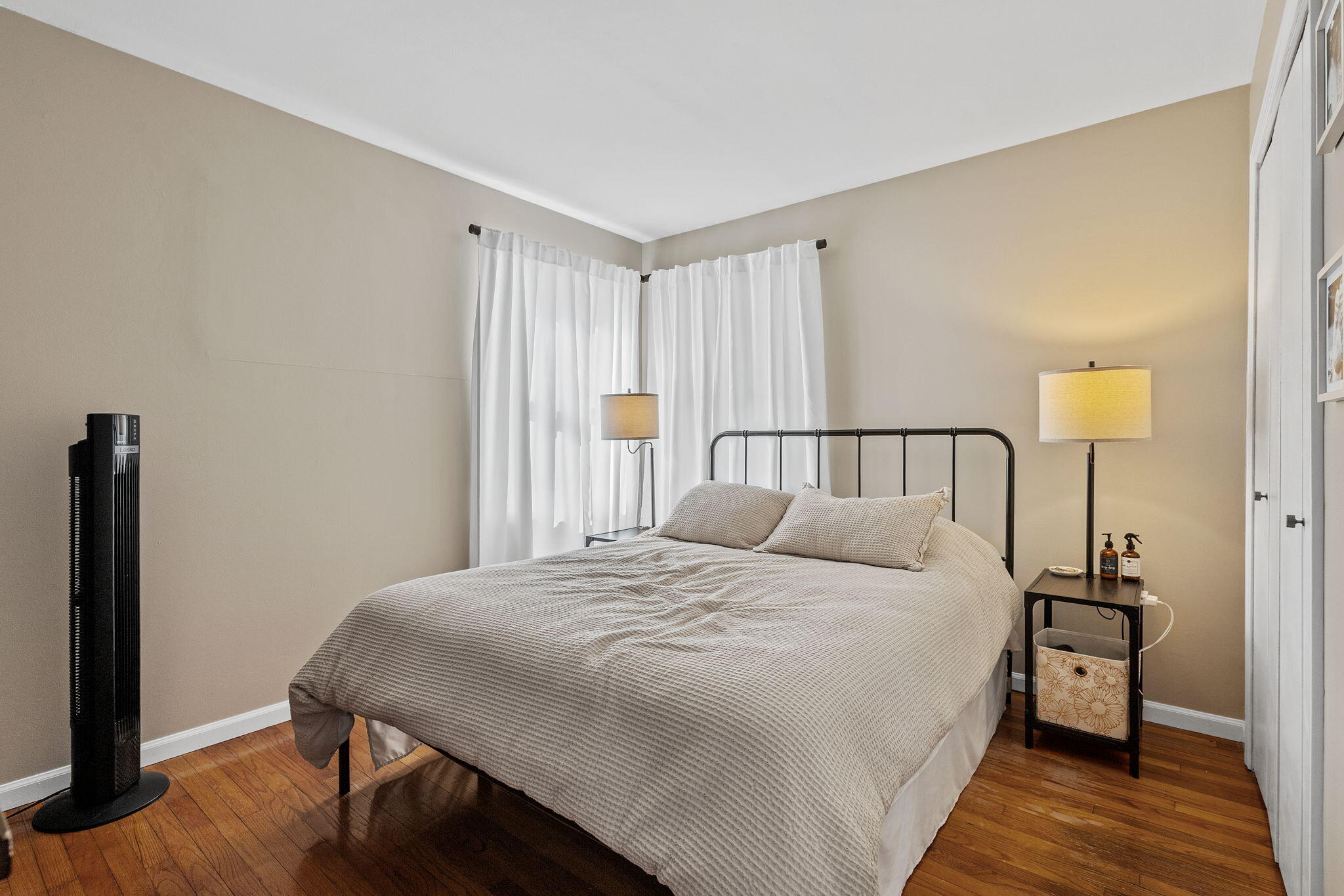 810 East Grace Street Rensselaer, IN 47978 - Photo 10 of 17 a bedroom with a bed and a night stand