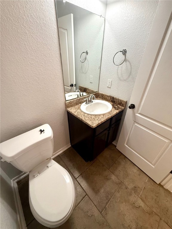 2205 Cardinales Lane Corpus Christi, TX 78414 - Photo 11 of 34 a bathroom with a sink and mirror