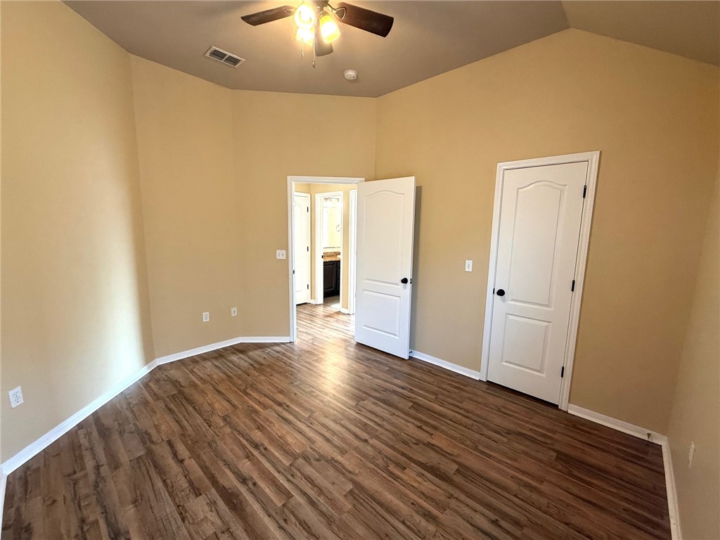 2205 Cardinales Lane Corpus Christi, TX 78414 - Photo 7 of 34 wooden floor in an empty room with a window