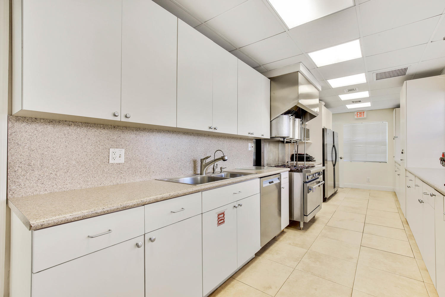 2871 North Ocean Boulevard, Unit C205 Boca Raton, FL 33431 - Photo 46 of 97 16_san_remo_clubhouse_kitchen