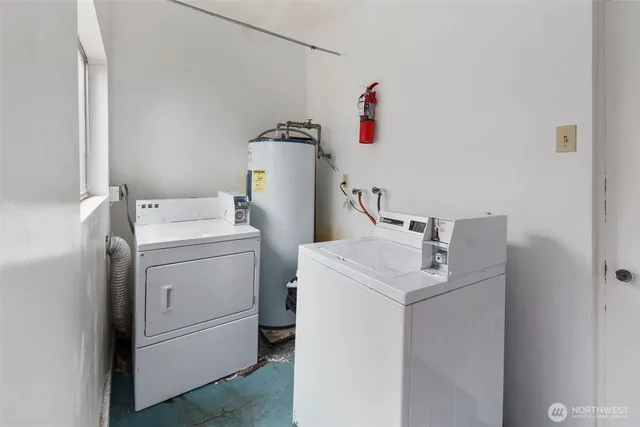 a utility room with furniture dryer and washer