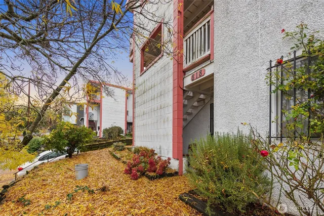a kitchen with a sink cabinets and appliances