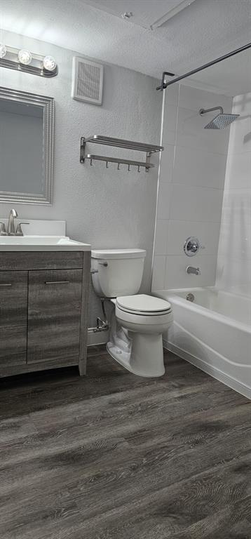 4845 Cedar Springs Road, Unit 167 Dallas, TX 75219 - Photo 6 of 10 a bathroom with a sink toilet and shower