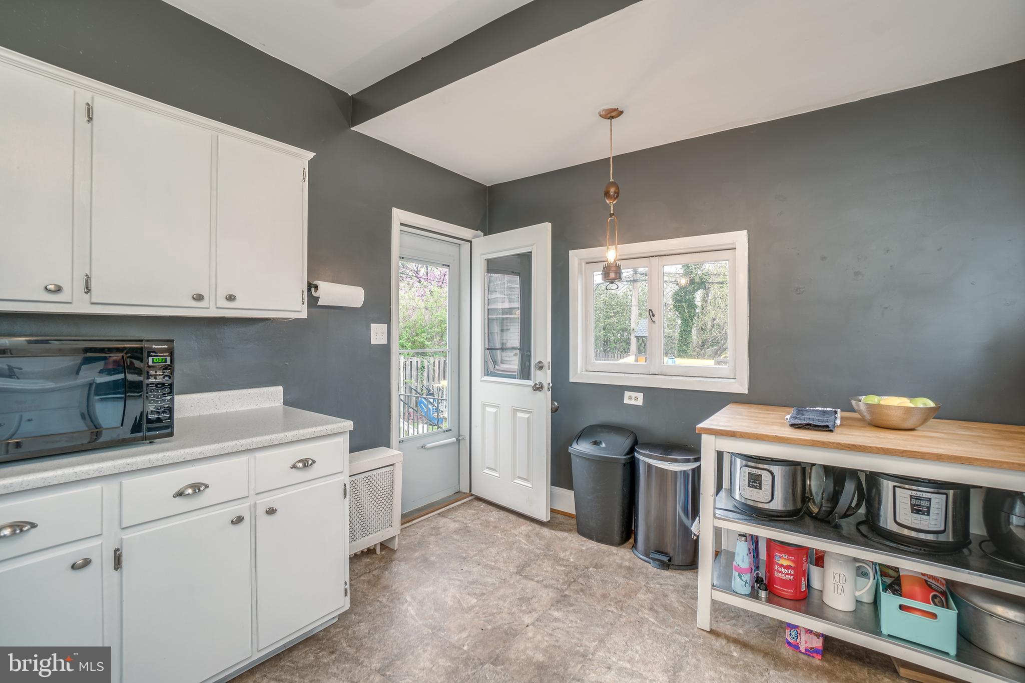 9 Ridge Road Baltimore, MD 21228 - Photo 15 of 31 Extra work space + door to rear yard & deck