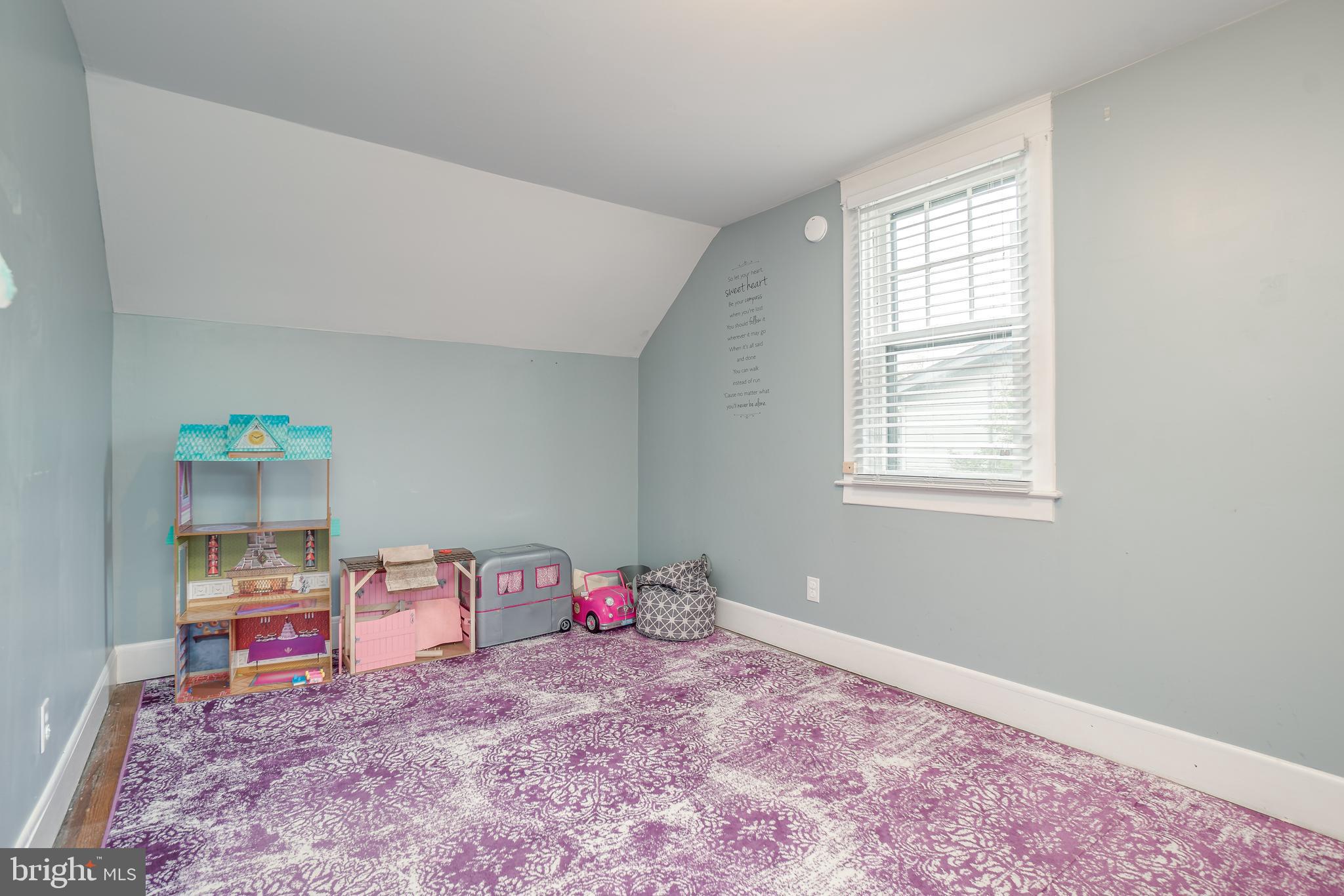 9 Ridge Road Baltimore, MD 21228 - Photo 23 of 31 2nd level bedroom # 3 with built-ins & wood floors