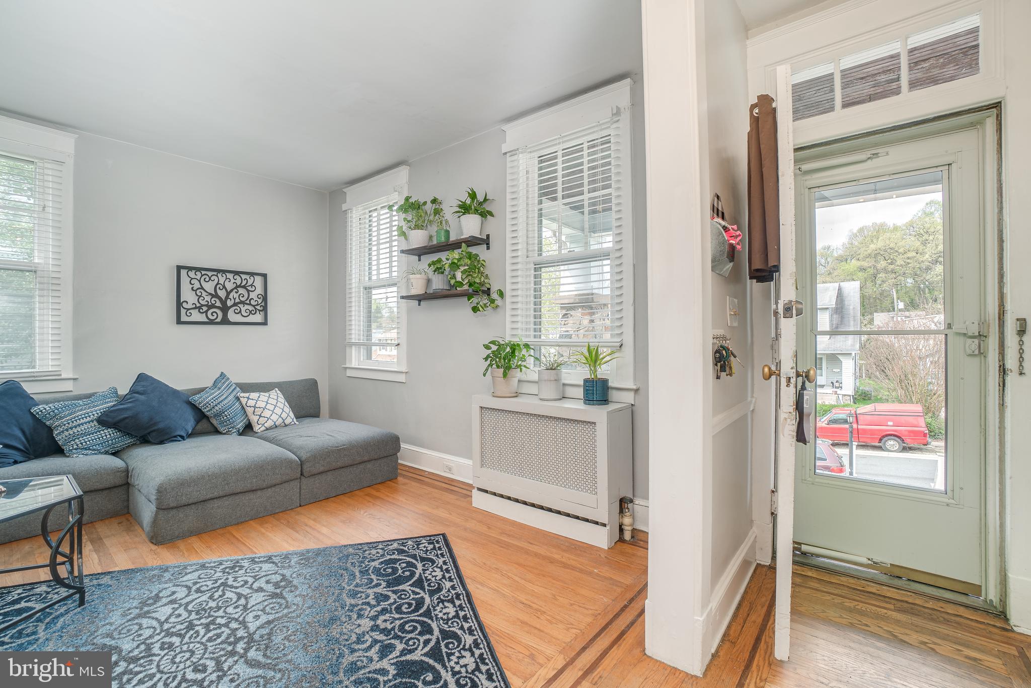 9 Ridge Road Baltimore, MD 21228 - Photo 5 of 31 Living Room area with exposed in-laid wood fls