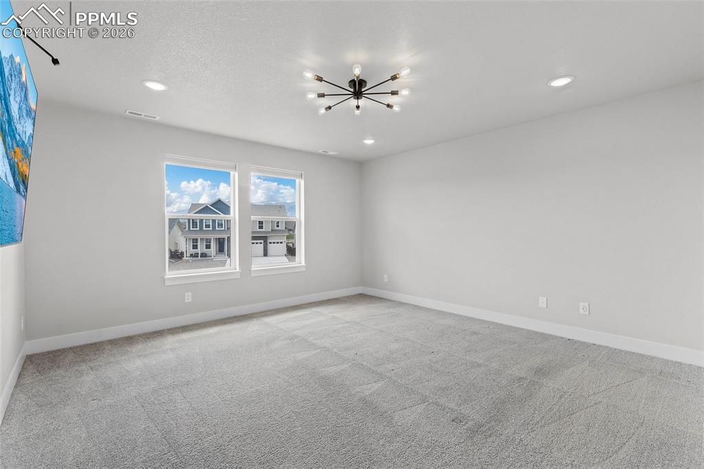 15777 Little Bluestem Road Monument, CO 80132 - Photo 35 of 50 a view of an empty room with a window