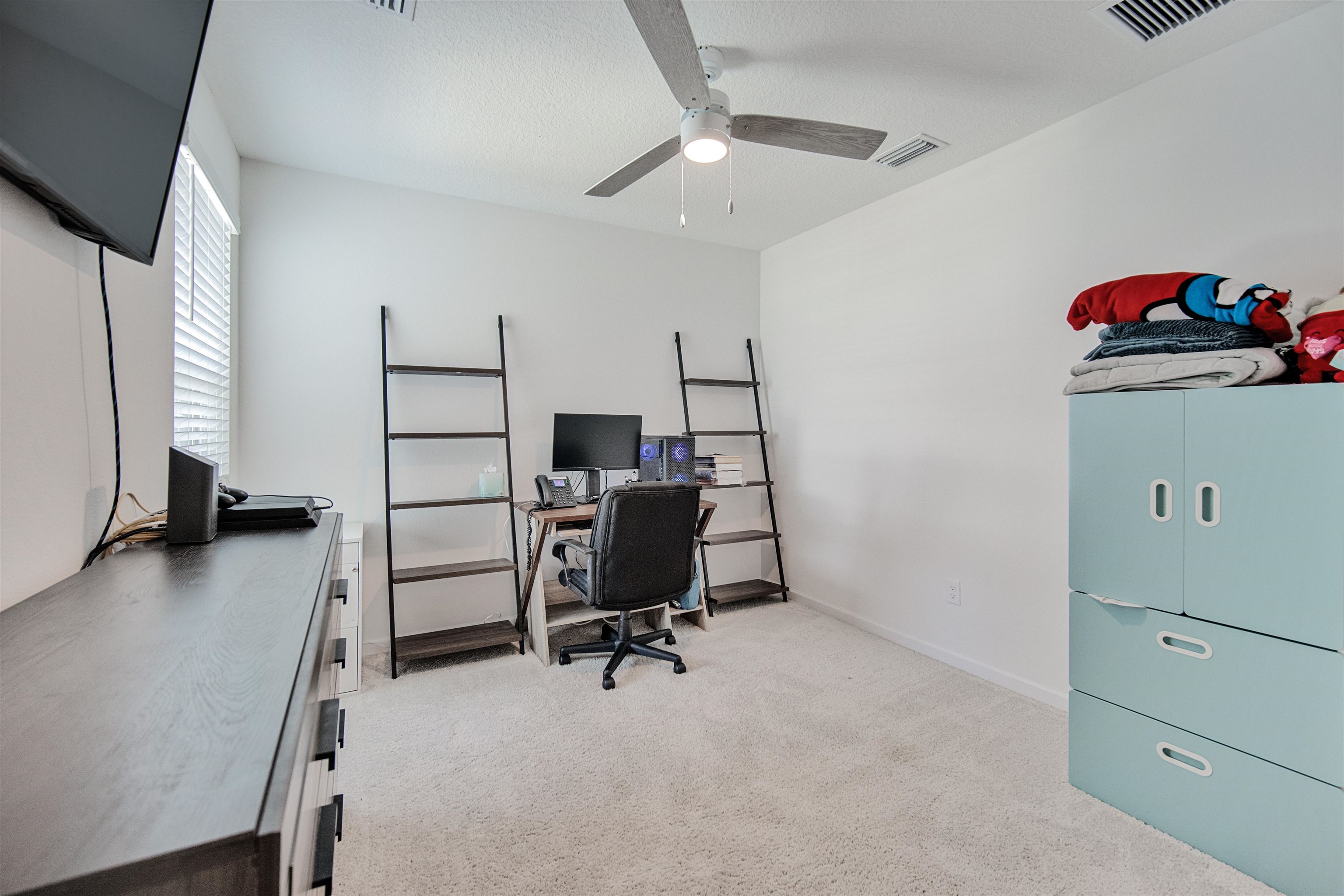 98 Ridge Lake Road St. Augustine, FL 32086 - Photo 19 of 31 a view of a workspace with furniture