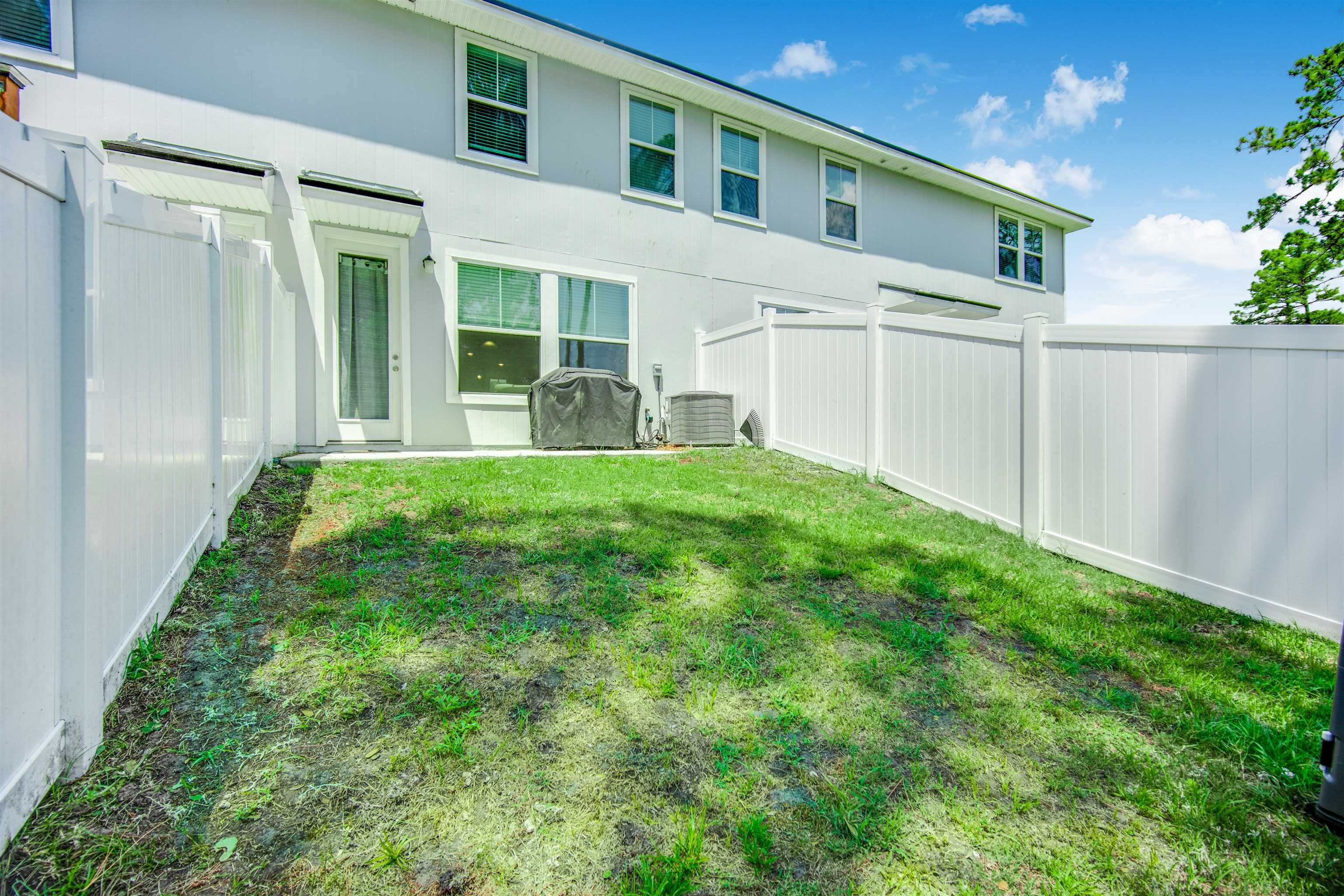 98 Ridge Lake Road St. Augustine, FL 32086 - Photo 26 of 31 a view of a house with a yard