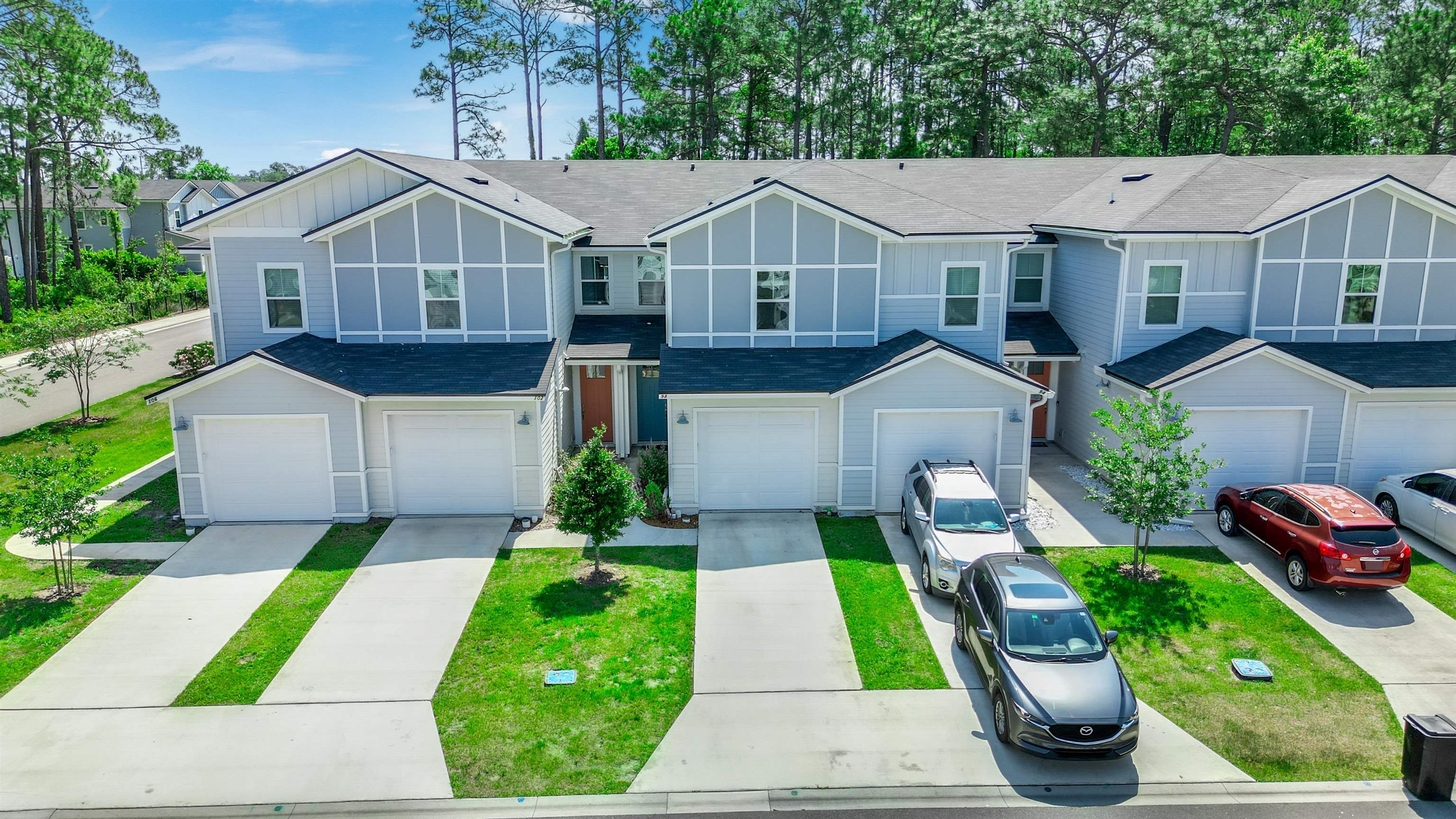 98 Ridge Lake Road St. Augustine, FL 32086 - Photo 28 of 31 a view of house with garden and tall tress