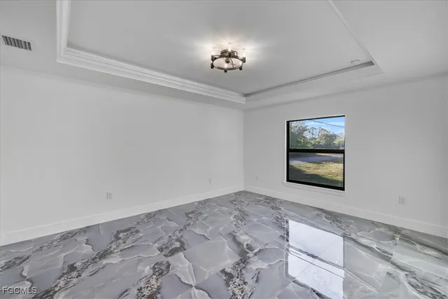 a view of a hallway with a chandelier