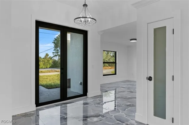 a view of a hallway with windows