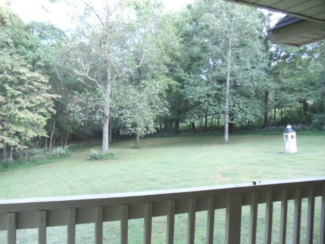 1998 Hidden Hills Road Pulaski, TN 38478 - Photo 2 of 20 a backyard of a house with a yard