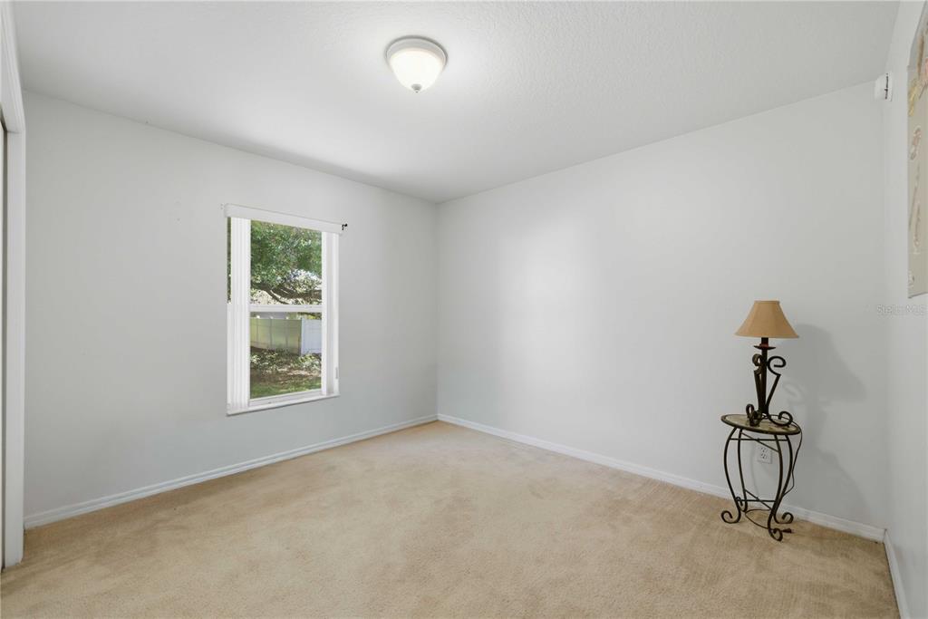 3959 Southwest 129th Street Ocala, FL 34473 - Photo 9 of 27 an empty room with a window